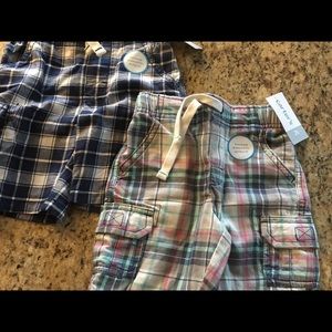 2 pair of Carter’s 2t cargo shorts.  Never worn!